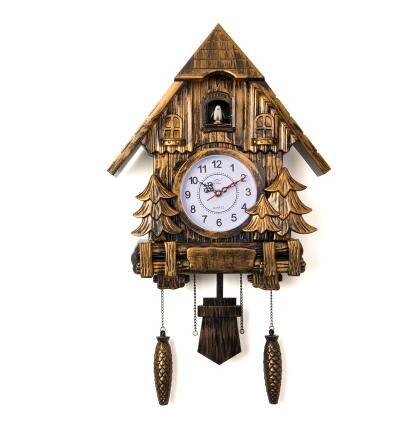 Horloge ancienne coucou dorée